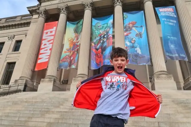 Jackson poses in front of the Franklin Institute for the Marvel Universe of Superheros Exhibit